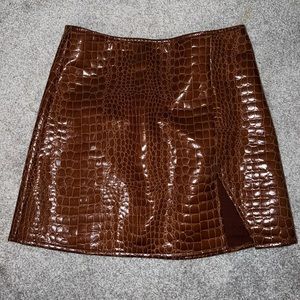Brown, animal print skirt with slit. Size: S